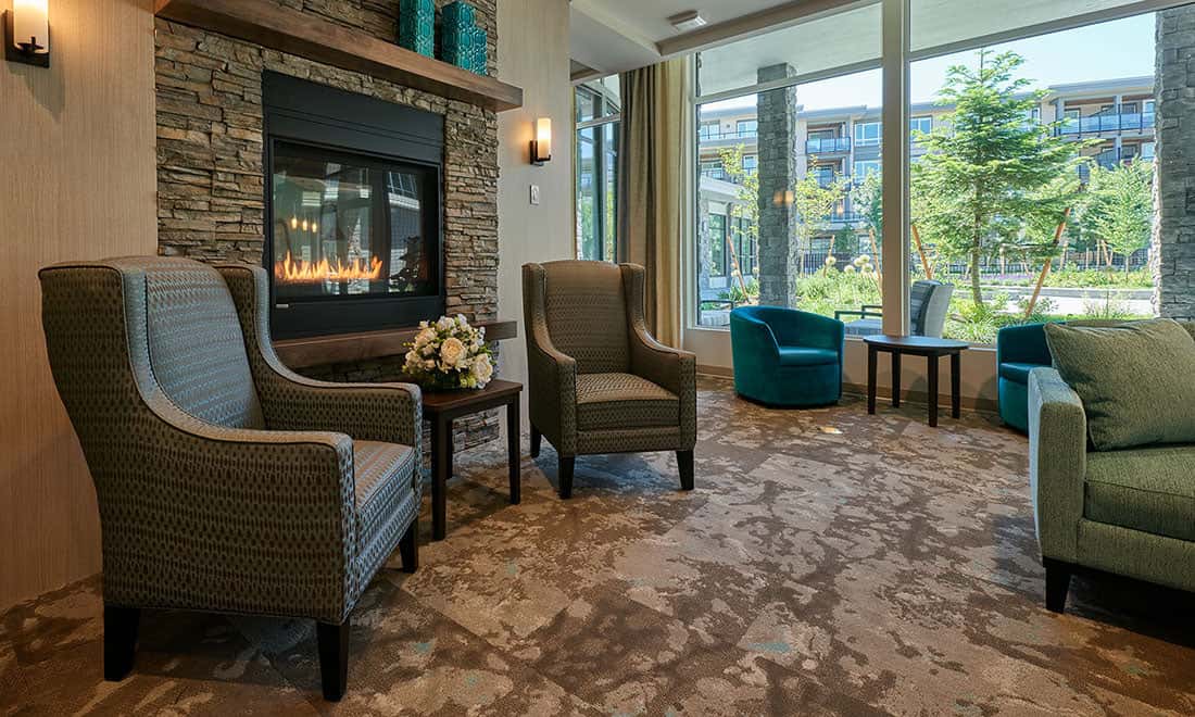 Senior living common area with comfortable lounge seating